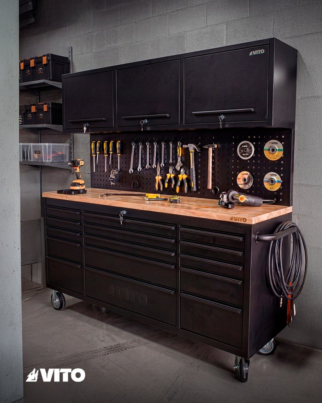 Garage Storage Modern: 12 Ideas That Free Up Floor Space 7 Black rolling workbench with a wooden top and various tools organized on its surface.